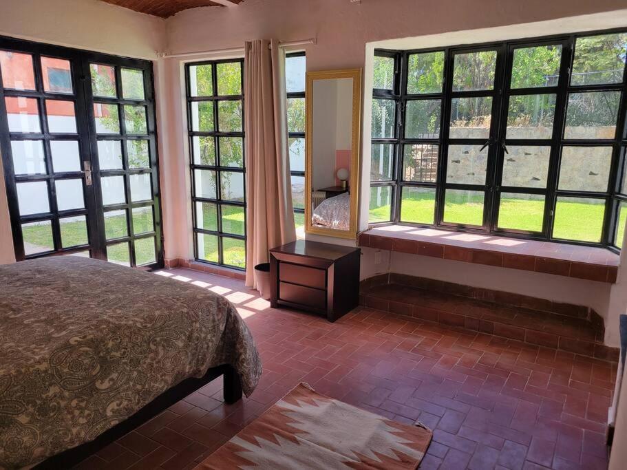 Ένα ή περισσότερα κρεβάτια σε δωμάτιο στο Casa Bugambilias - Hermosa casa centrica para 8