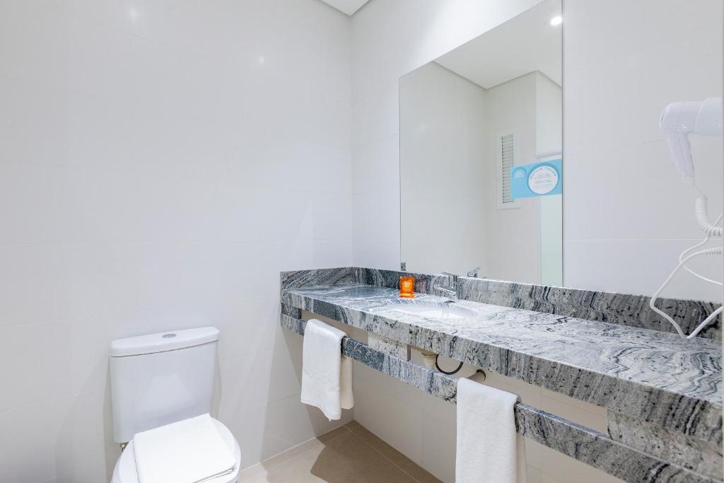 Koupelna v ubytování Tri Hotel Executive Osório