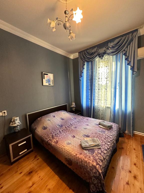 Postel nebo postele na pokoji v ubytování Mate Guesthouse