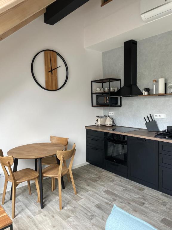 Kuchyň nebo kuchyňský kout v ubytování Apartmán Bella