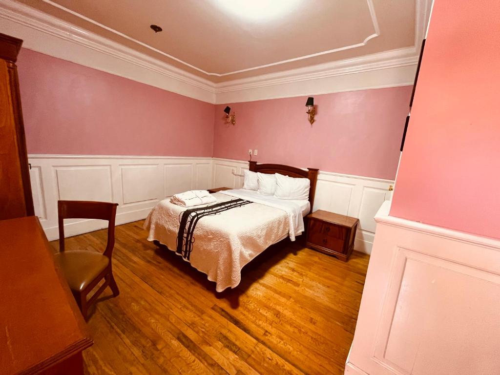 Postel nebo postele na pokoji v ubytování Hotel Real Del Monte