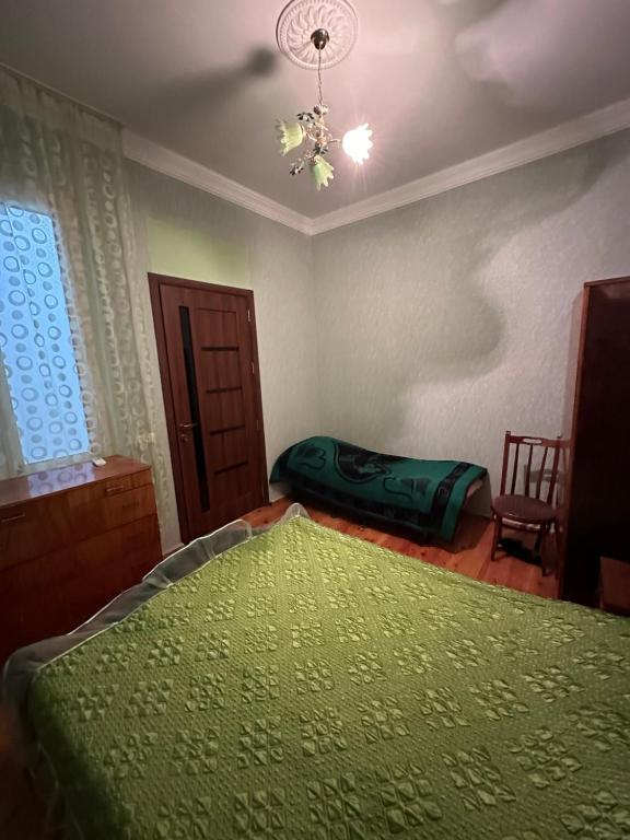 Postel nebo postele na pokoji v ubytování Mate Guesthouse