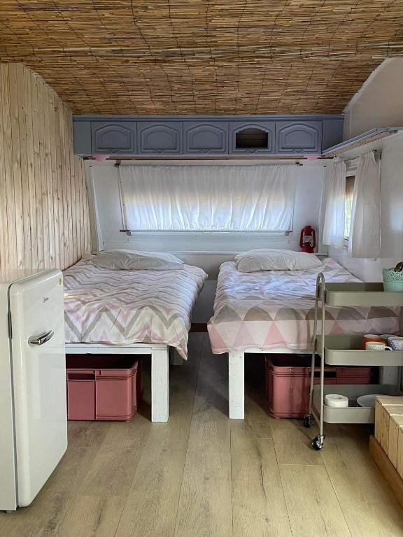 Postel nebo postele na pokoji v ubytování Camping Rogowo