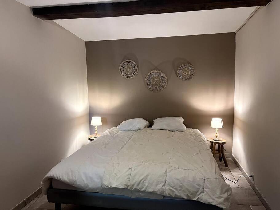 Postel nebo postele na pokoji v ubytování Charme gîte Vacances Véro