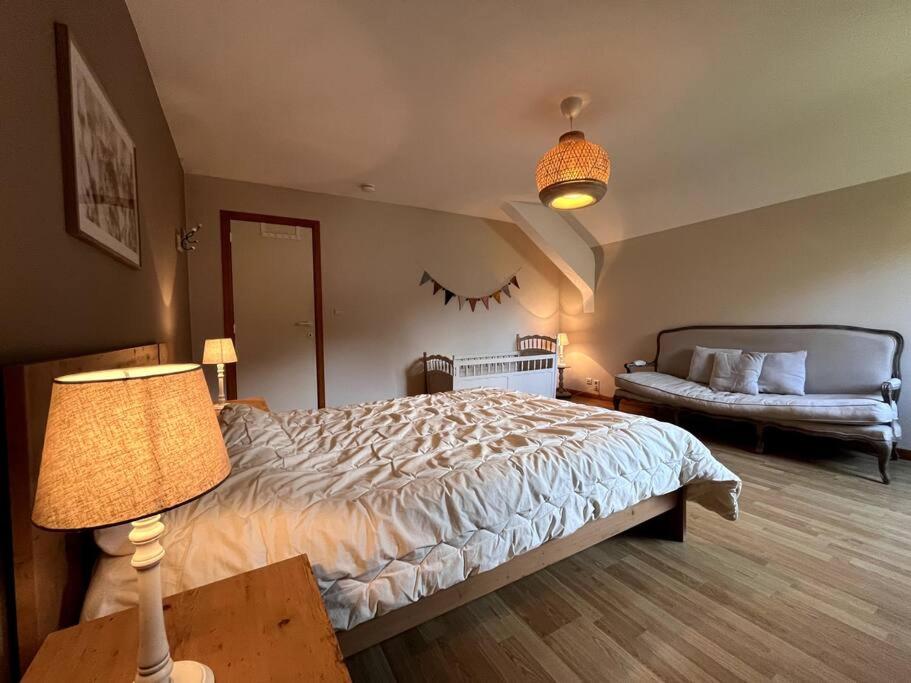 Postel nebo postele na pokoji v ubytování Charme gîte Vacances Véro