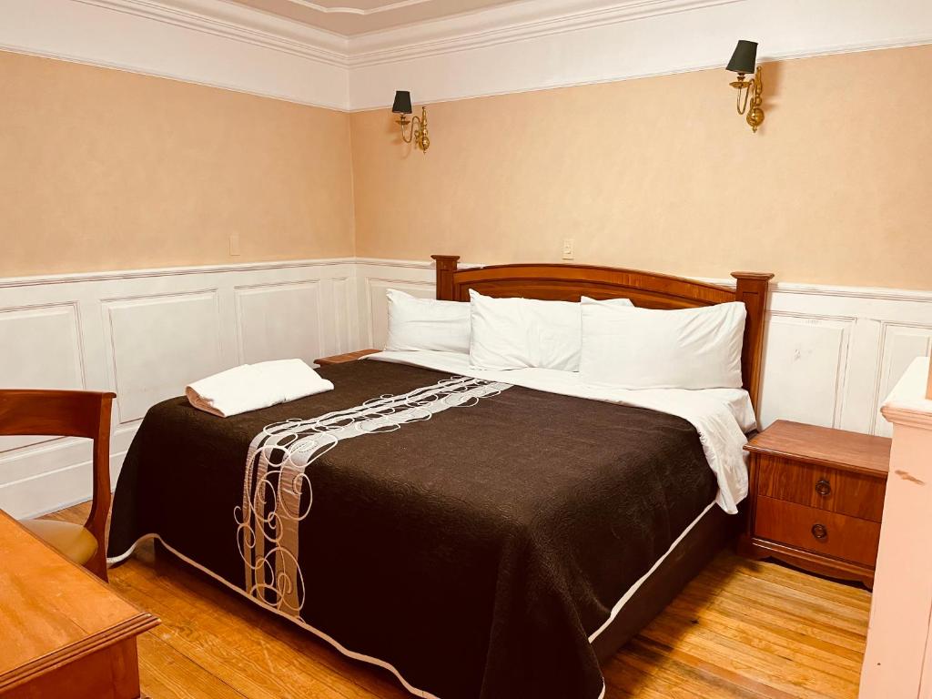 Postel nebo postele na pokoji v ubytování Hotel Real Del Monte