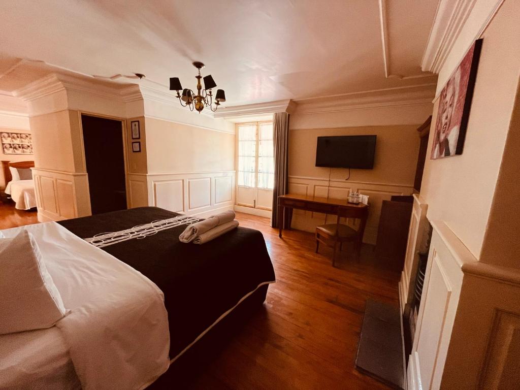 TV a/nebo společenská místnost v ubytování Hotel Real Del Monte