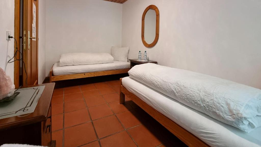Postel nebo postele na pokoji v ubytování Hotel Santana