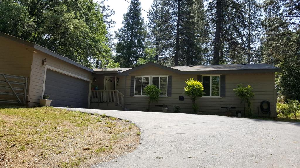 a house with a driveway in front of it at Explore Amador and Calaveras County. in West Point