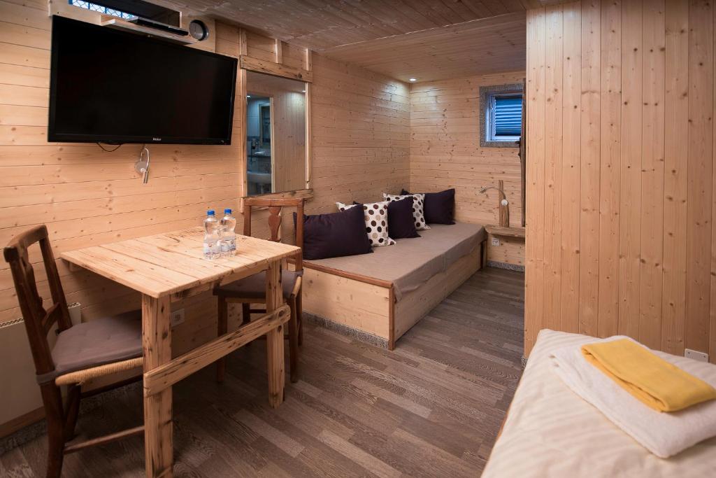 TV a/nebo společenská místnost v ubytování Hotel Santana