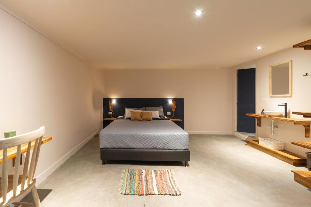 Postel nebo postele na pokoji v ubytování Casa Mosaiko Nutibara Laureles