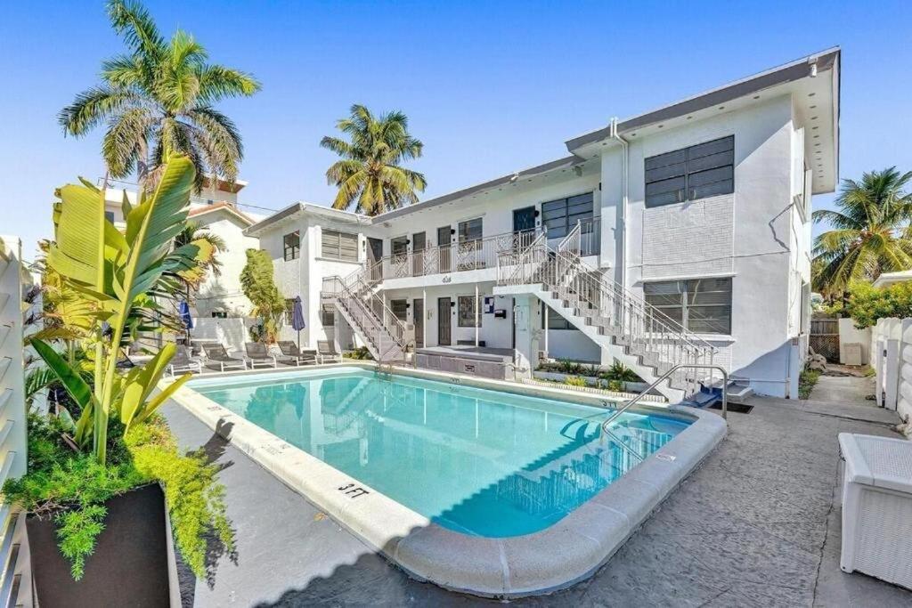 an exterior view of a house with a swimming pool at Waves On Desoto Lovely Studio # 2 in Hollywood