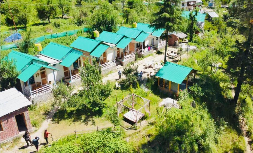 an overhead view of a village with houses at The Stream Kasol in Kasol