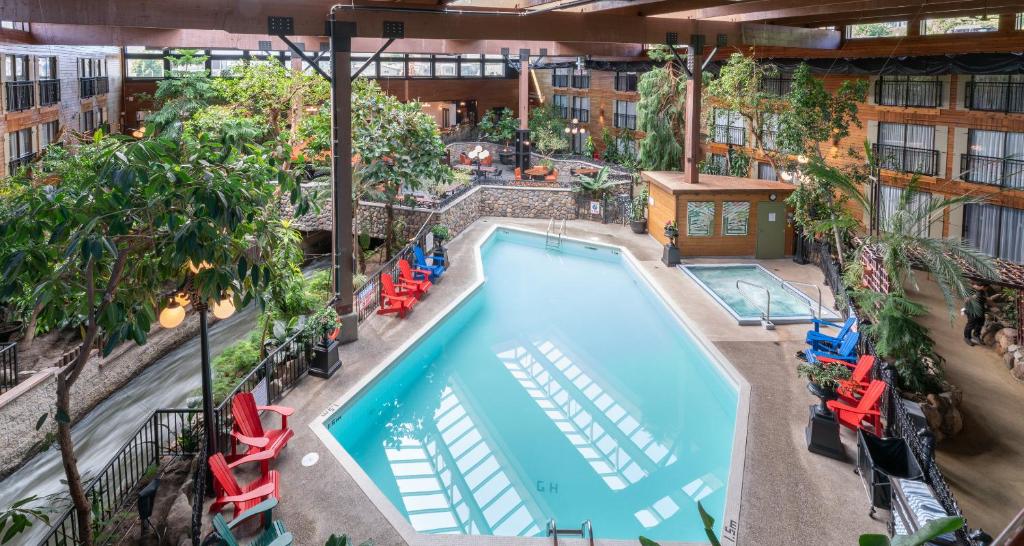 an overhead view of a pool at a hotel at Prestige Vernon Lodge in Vernon