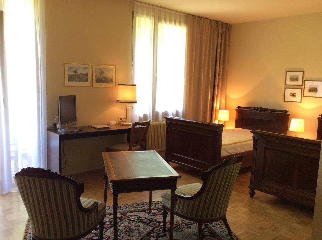 Postel nebo postele na pokoji v ubytování Hotel Garni - Appartements Fuksas