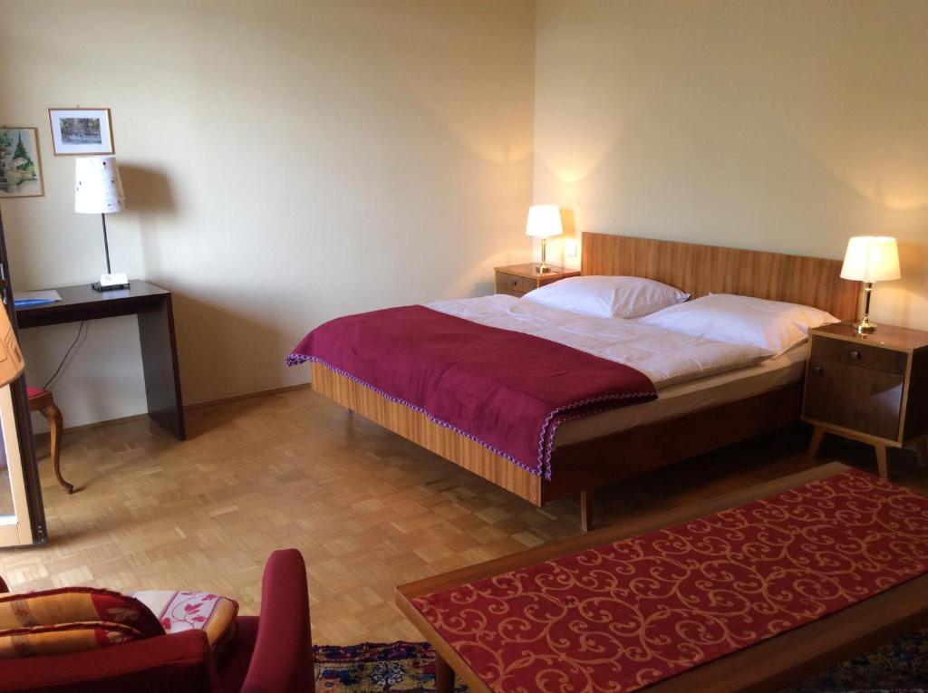 Postel nebo postele na pokoji v ubytování Hotel Garni - Appartements Fuksas