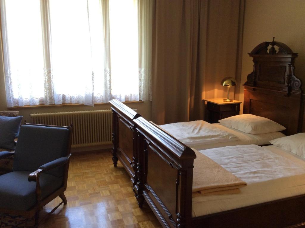 Postel nebo postele na pokoji v ubytování Hotel Garni - Appartements Fuksas