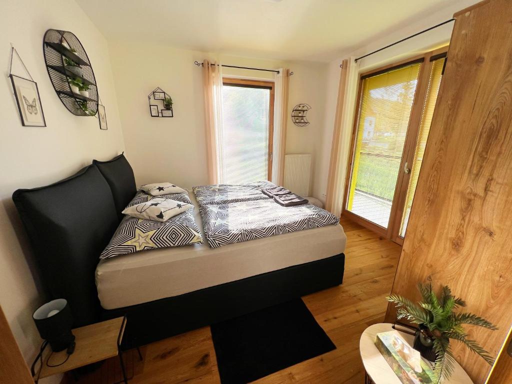 Postel nebo postele na pokoji v ubytování Apartmán NatEmi u sjezdovky Filipovice