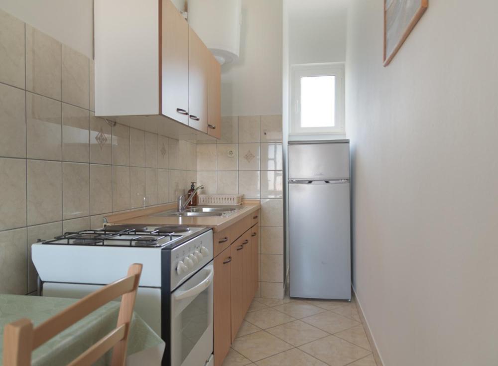 Kuchyň nebo kuchyňský kout v ubytování Rasin Apartments