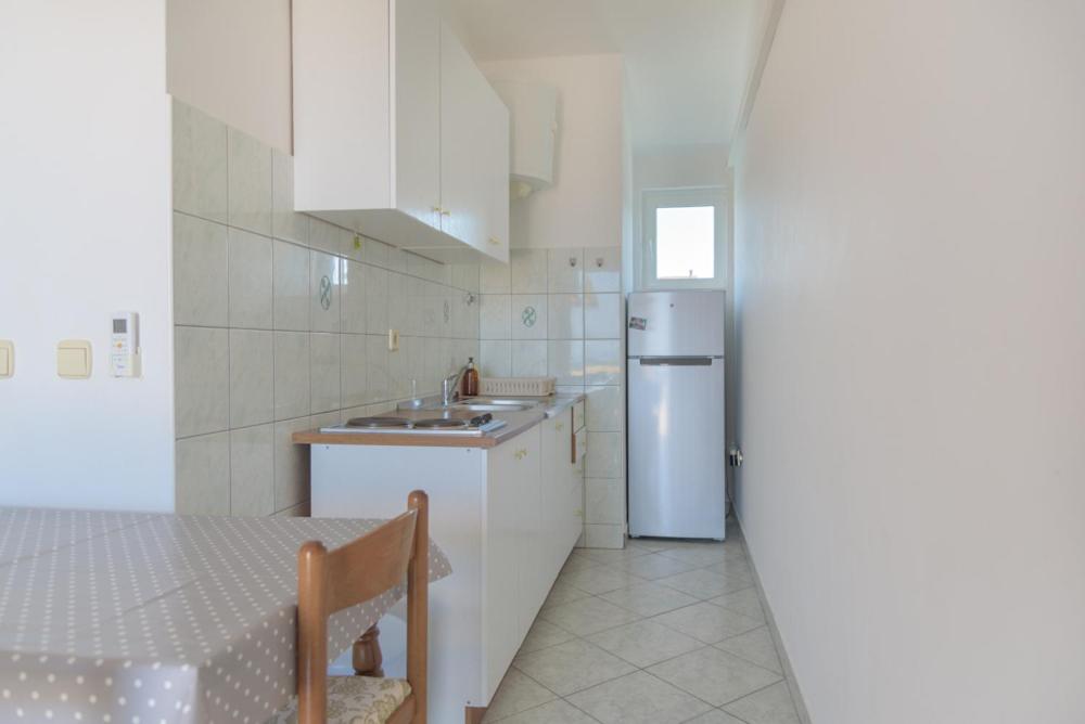 Kuchyň nebo kuchyňský kout v ubytování Rasin Apartments