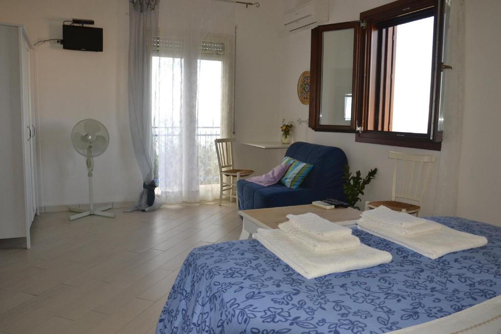 Postel nebo postele na pokoji v ubytování B&B Talìa