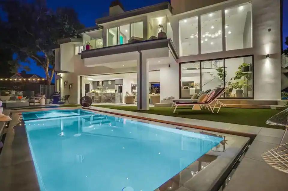 a large swimming pool in the backyard of a house at Troy Hill in Los Angeles