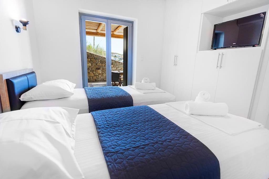 Postel nebo postele na pokoji v ubytování SeaeyeVillas 1