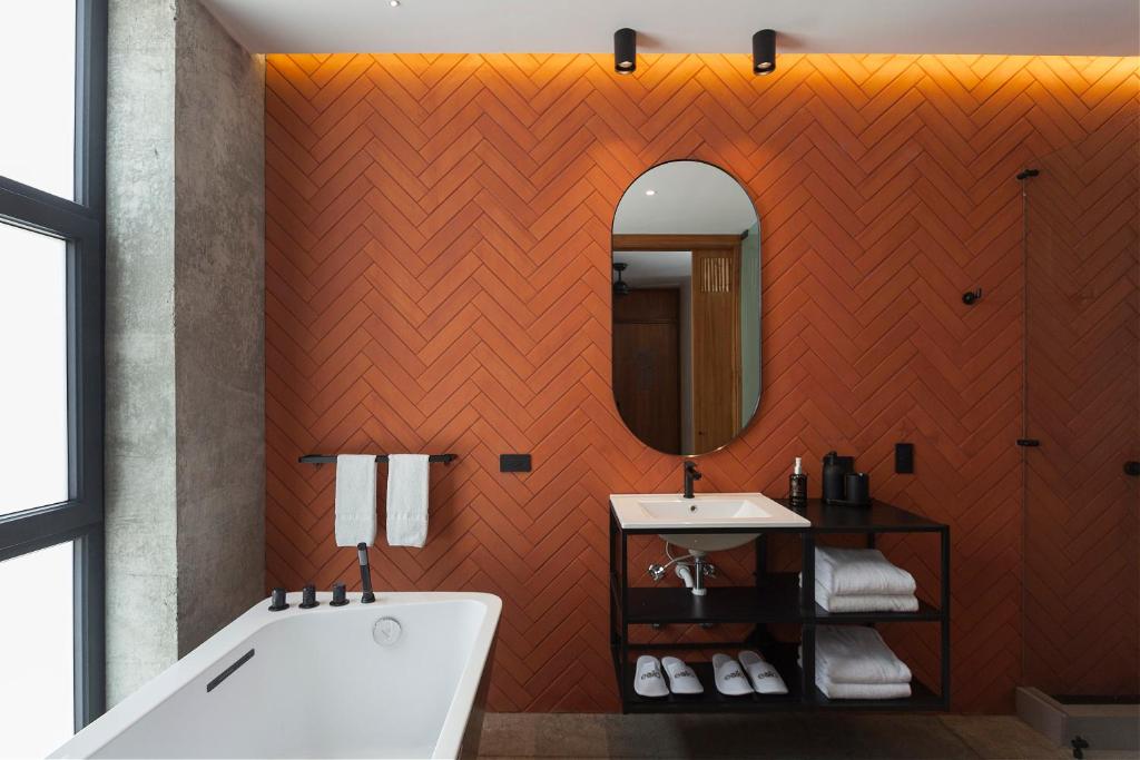 Koupelna v ubytování Eolia Sustainable Design Hotel