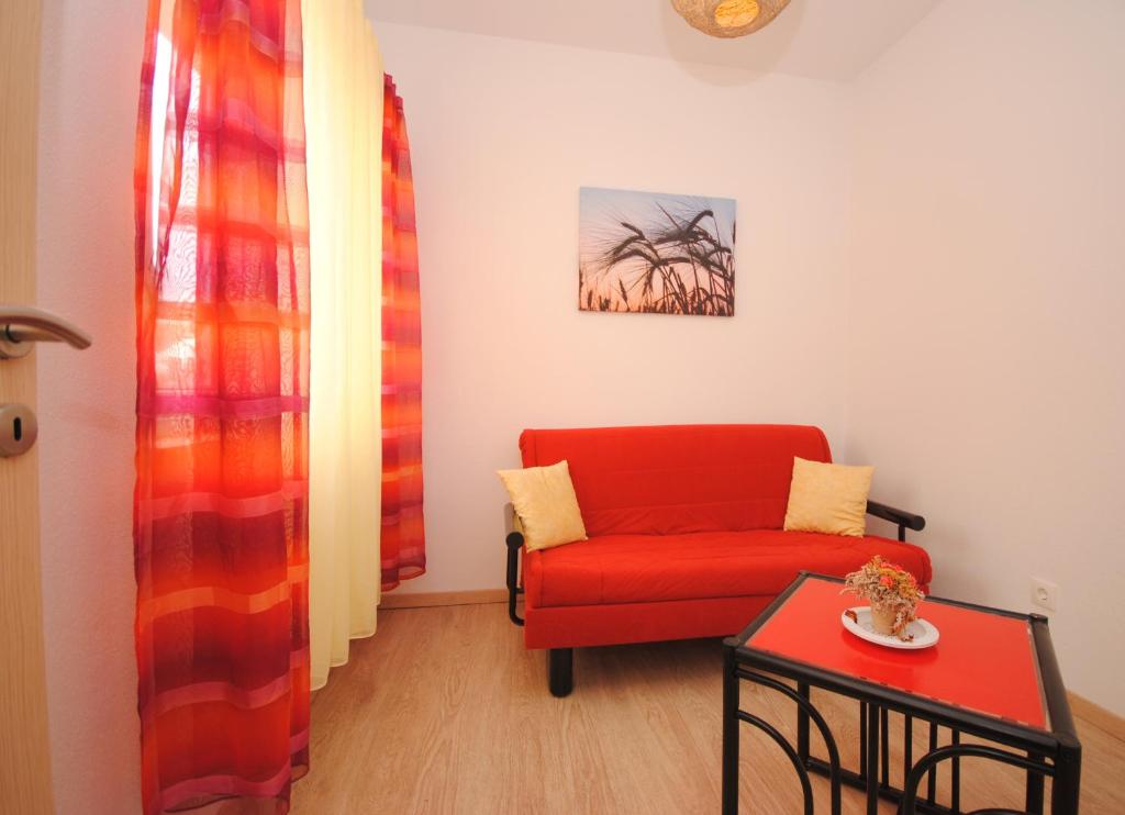Posedenie v ubytovaní Red Sunset Apartments