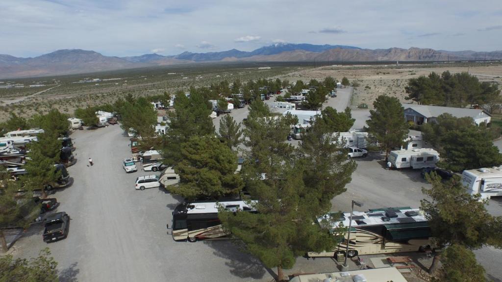 an aerial view of a rv park with trees and cars at Preferred RV Resort in Pahrump