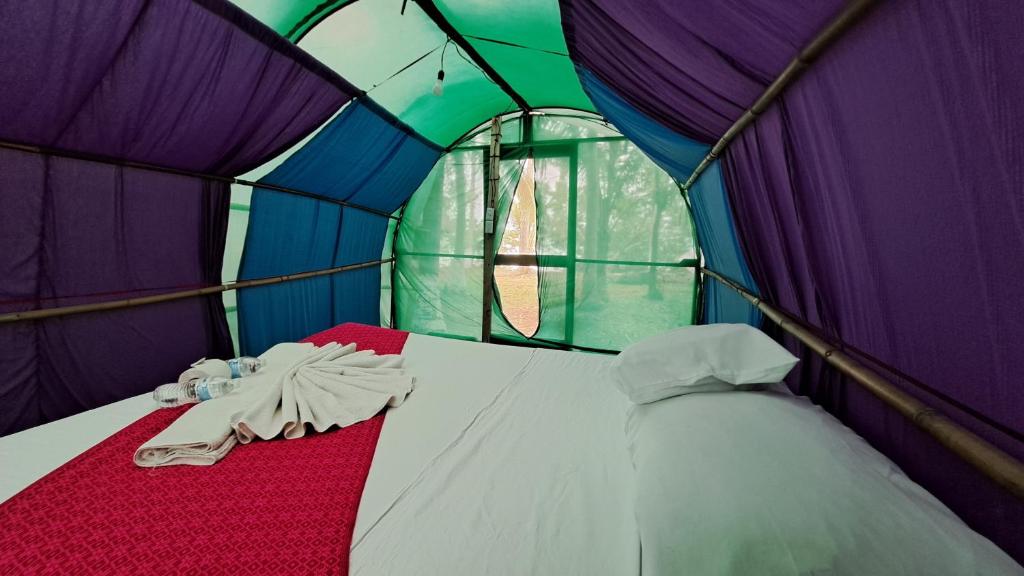 Postel nebo postele na pokoji v ubytování Cayuco Maya