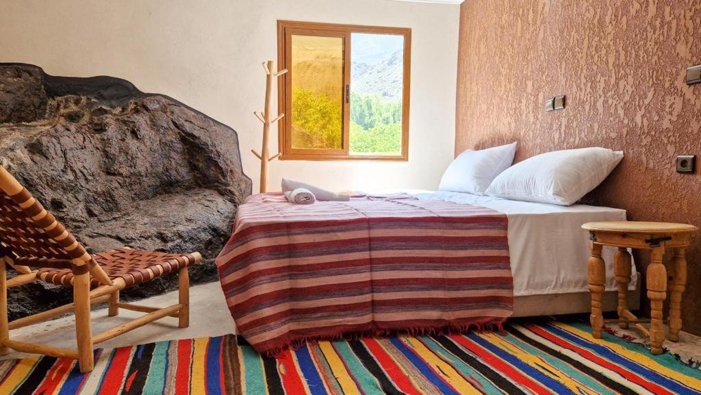 Postel nebo postele na pokoji v ubytování Atlas mountains Lodge