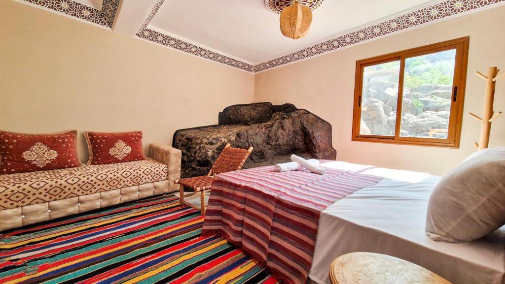 Postel nebo postele na pokoji v ubytování Atlas mountains Lodge