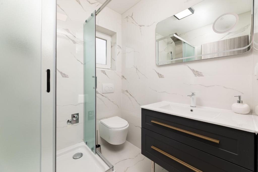 Koupelna v ubytování Apartments Vugrin