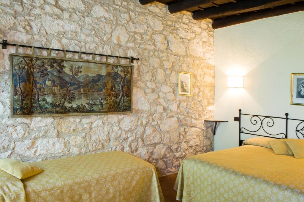 Postel nebo postele na pokoji v ubytování I Costanti