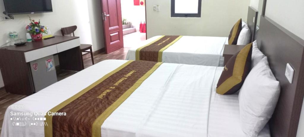 Postel nebo postele na pokoji v ubytování Family Transit 2 Hotel
