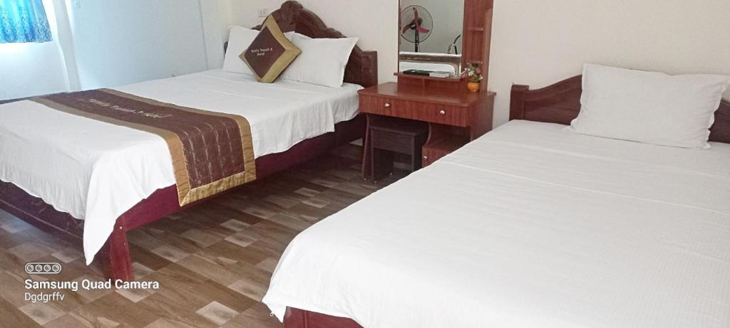 Postel nebo postele na pokoji v ubytování Family Transit 2 Hotel