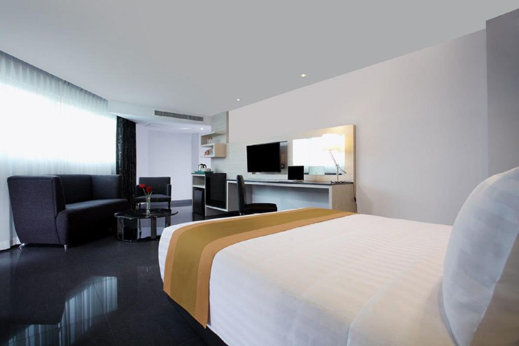 TV a/nebo společenská místnost v ubytování Nova Express Pattaya Hotel