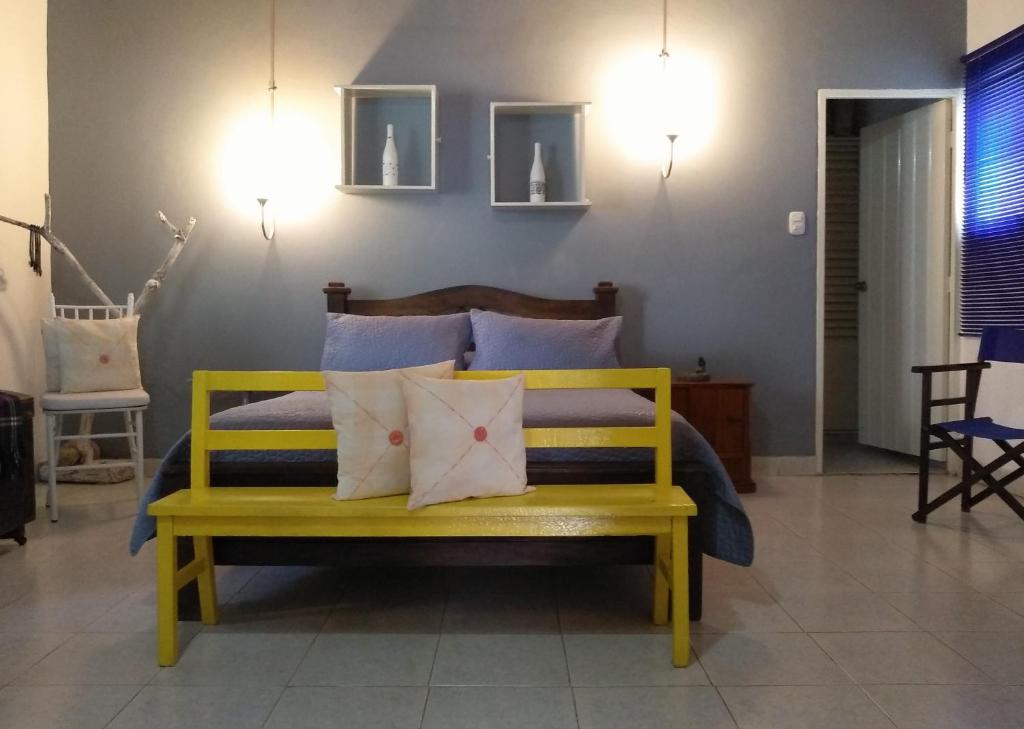 Postel nebo postele na pokoji v ubytování Habitación Casa Las Aves