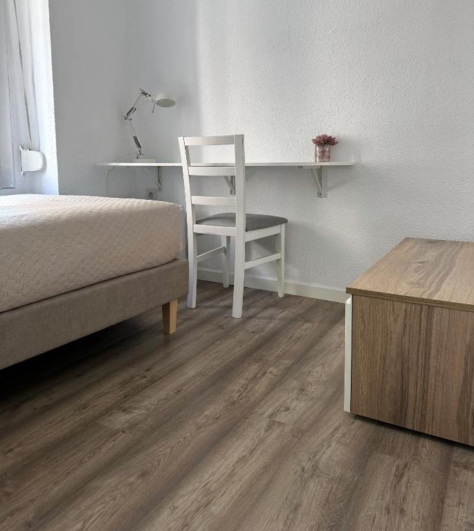 Postel nebo postele na pokoji v ubytování Slow Room Valencia