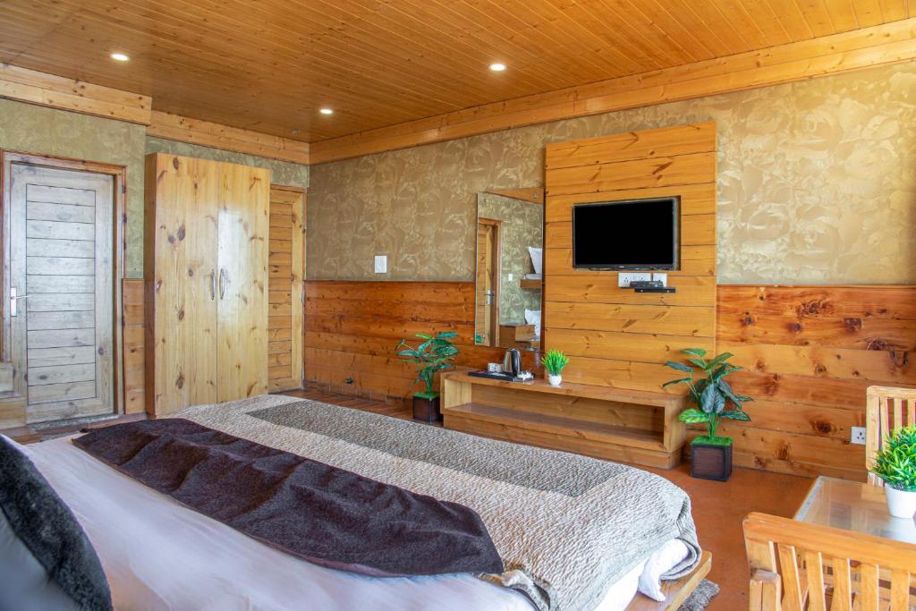 TV a/nebo společenská místnost v ubytování JK Dream View Kufri