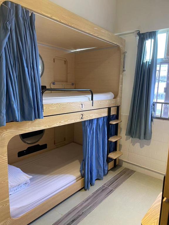 Katil atau katil-katil dalam bilik di Hong Kong Hostel