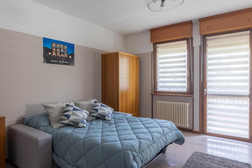 Postel nebo postele na pokoji v ubytování Casa vacanze- Debra