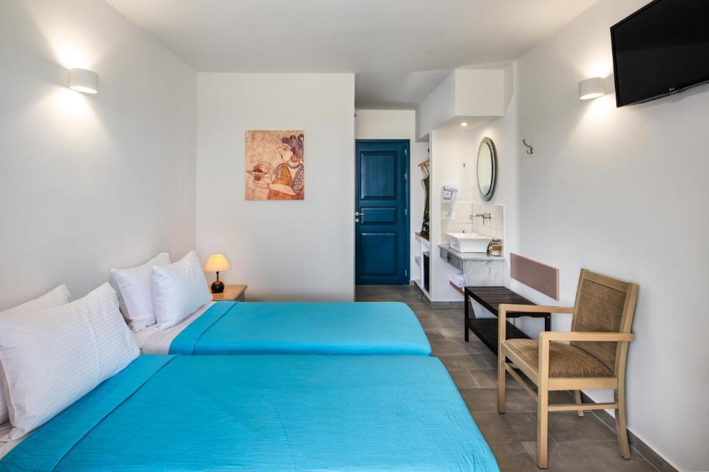Posteľ alebo postele v izbe v ubytovaní Kalimera Hotel
