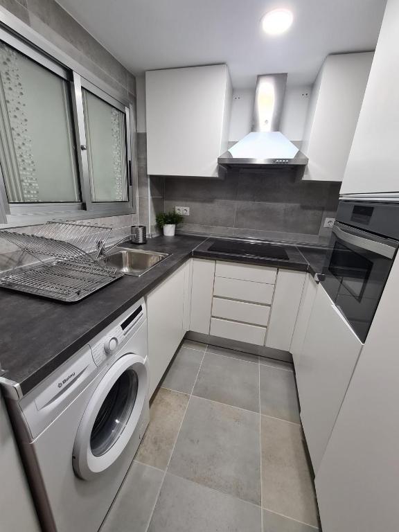 Kuchyň nebo kuchyňský kout v ubytování Apartamento Torre Colon IF Benidorm