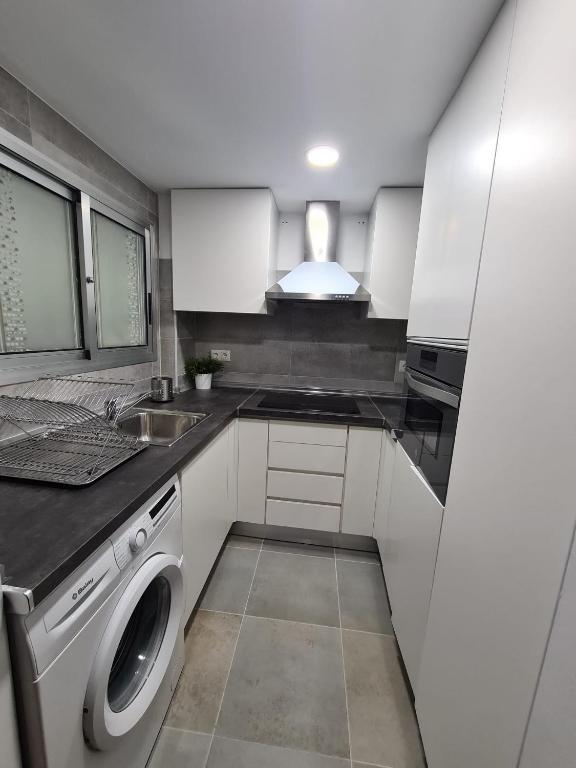 Kuchyň nebo kuchyňský kout v ubytování Apartamento Torre Colon IF Benidorm