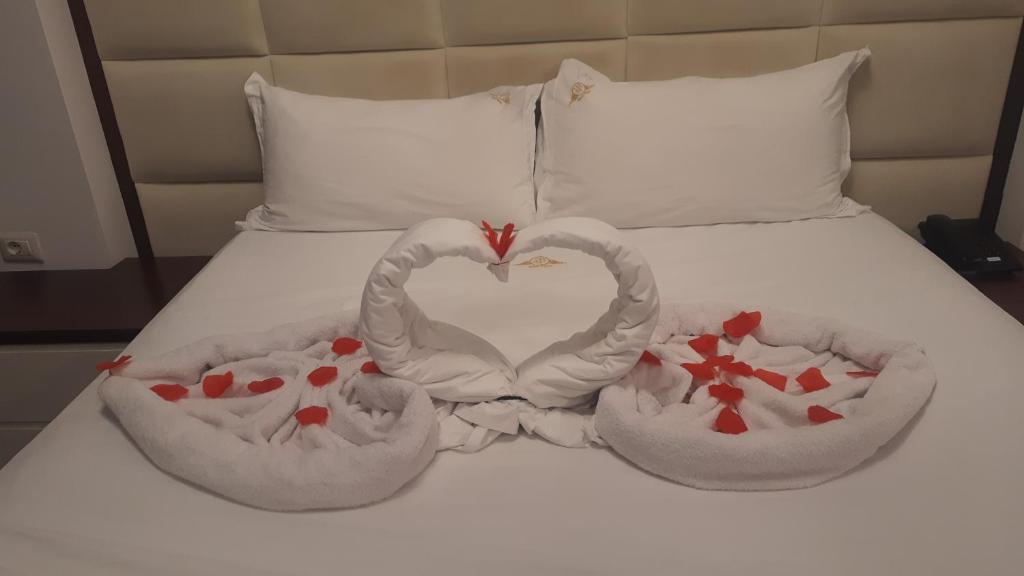 Postel nebo postele na pokoji v ubytování Hotel Palma