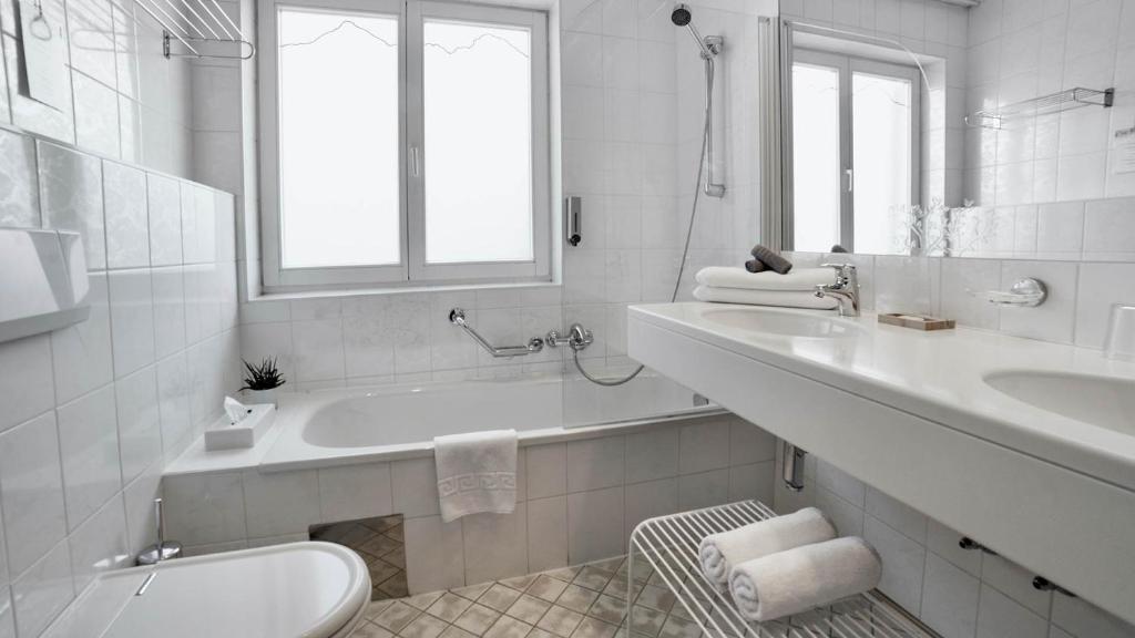 Koupelna v ubytování Boutique Hotel Olympia