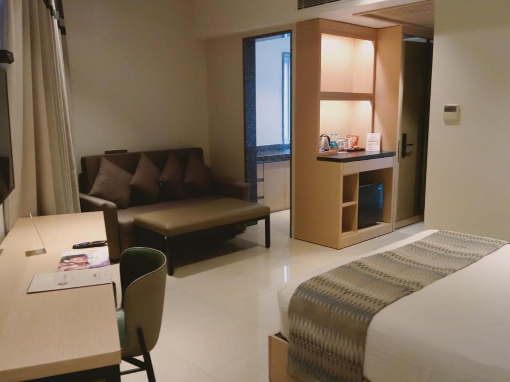 Postel nebo postele na pokoji v ubytování Click Hotel Bangalore - International Airport