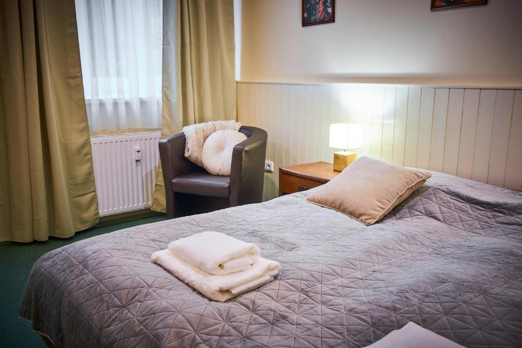 Postel nebo postele na pokoji v ubytování Penzion Weber